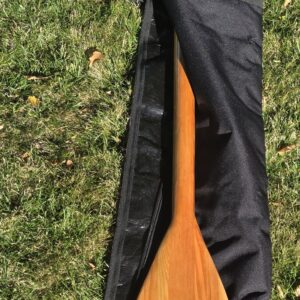 Premium custom wood oars paired with a heavy-duty travel oar bag handcrafted by Downstream Boatworks in Missoula Montana.