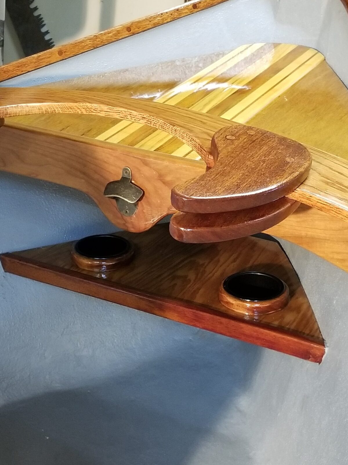 Custom forward wood kneelocks and built-in cup holders inside a modern composite drift boat.